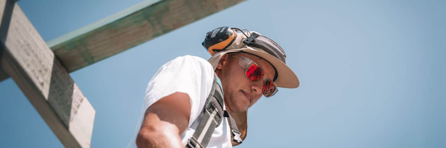 Red Mirror Lens Safety Glasses worn by tradie.